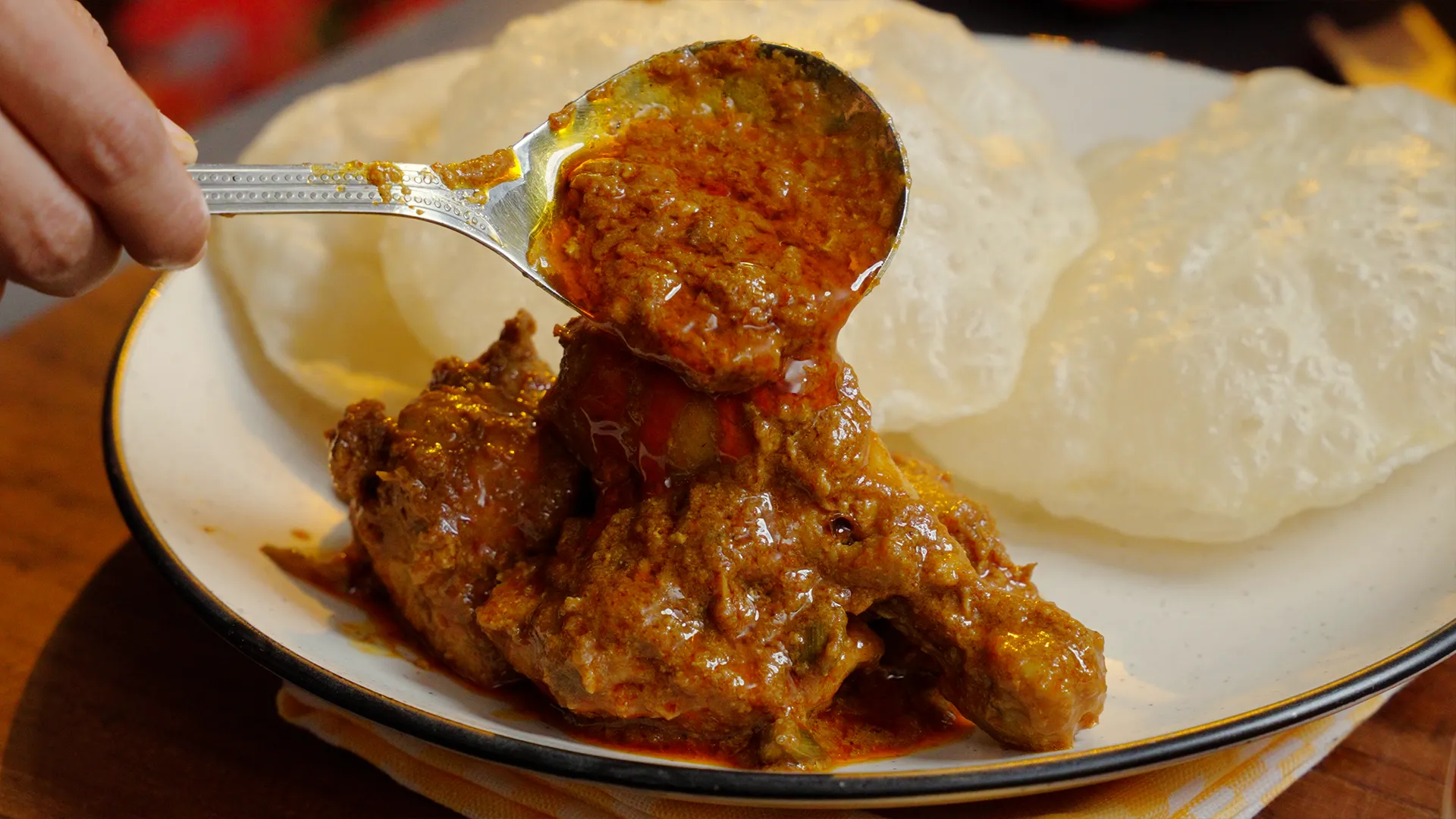 Bengali chicken kosha with thick masala served in a bowl.