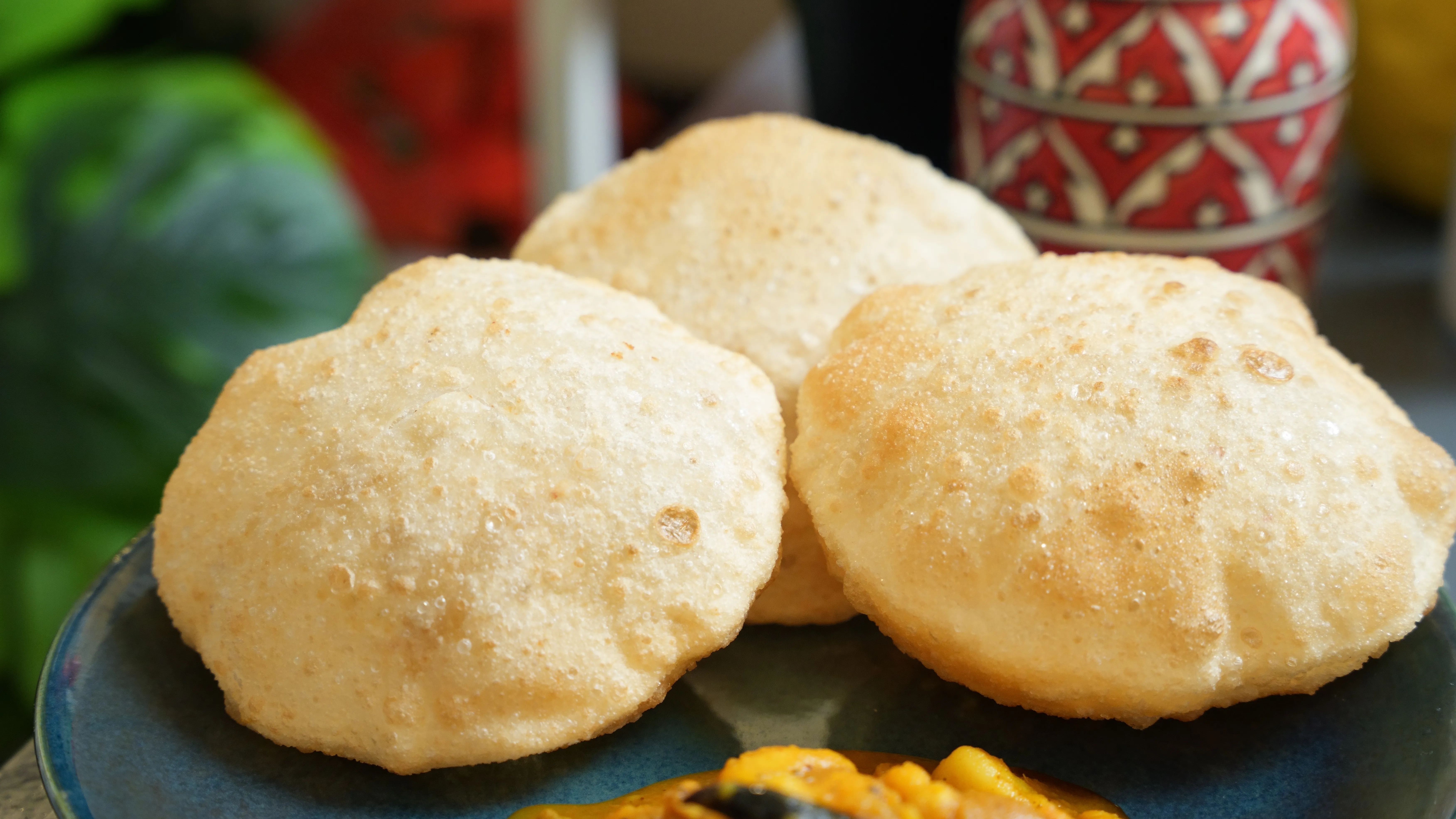 Bengali hing dal kochuri with a lightly puffed shell and urad dal filling.
