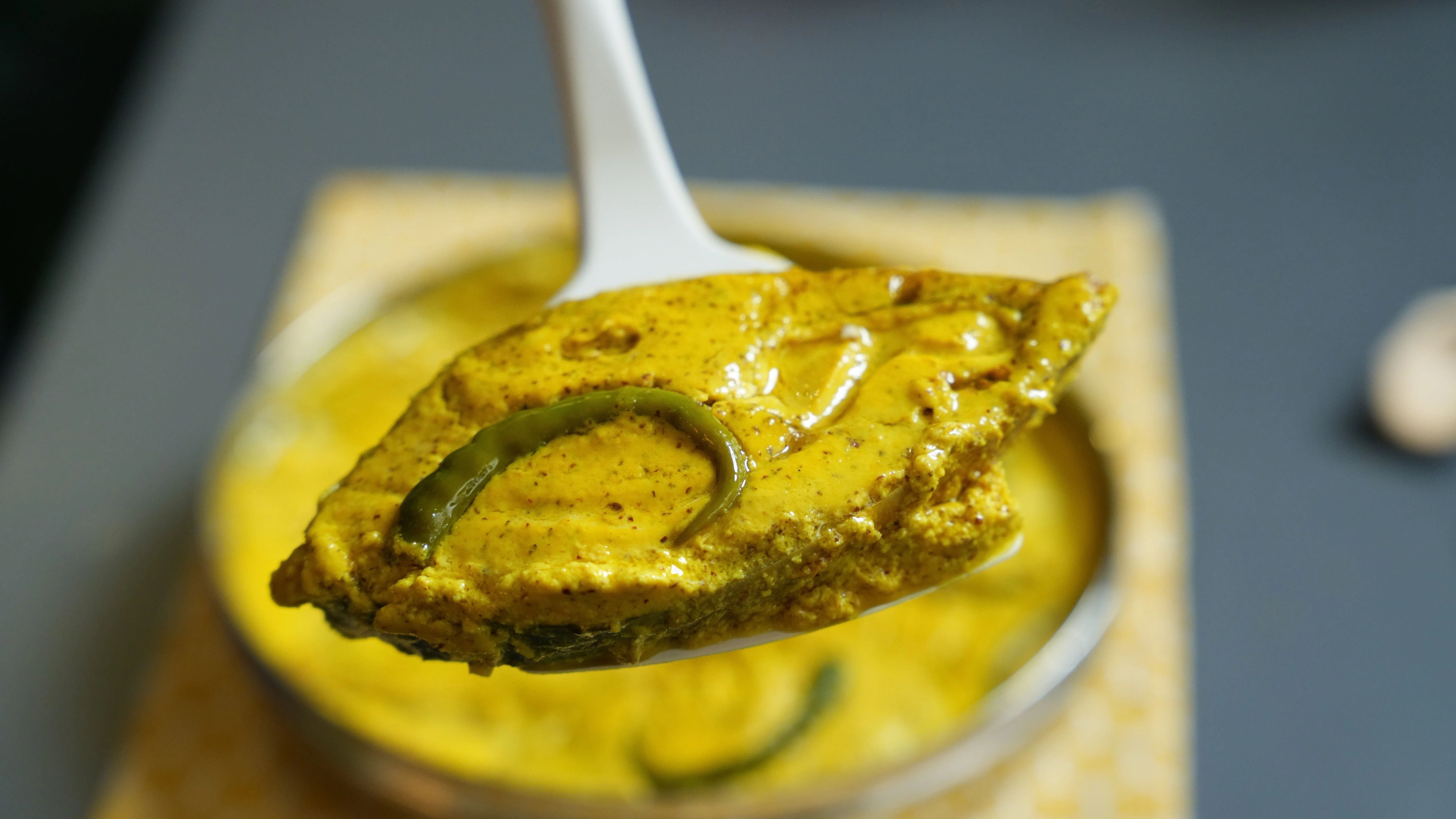 Bengali ilish bhapa with hilsa in mustard and coconut paste.