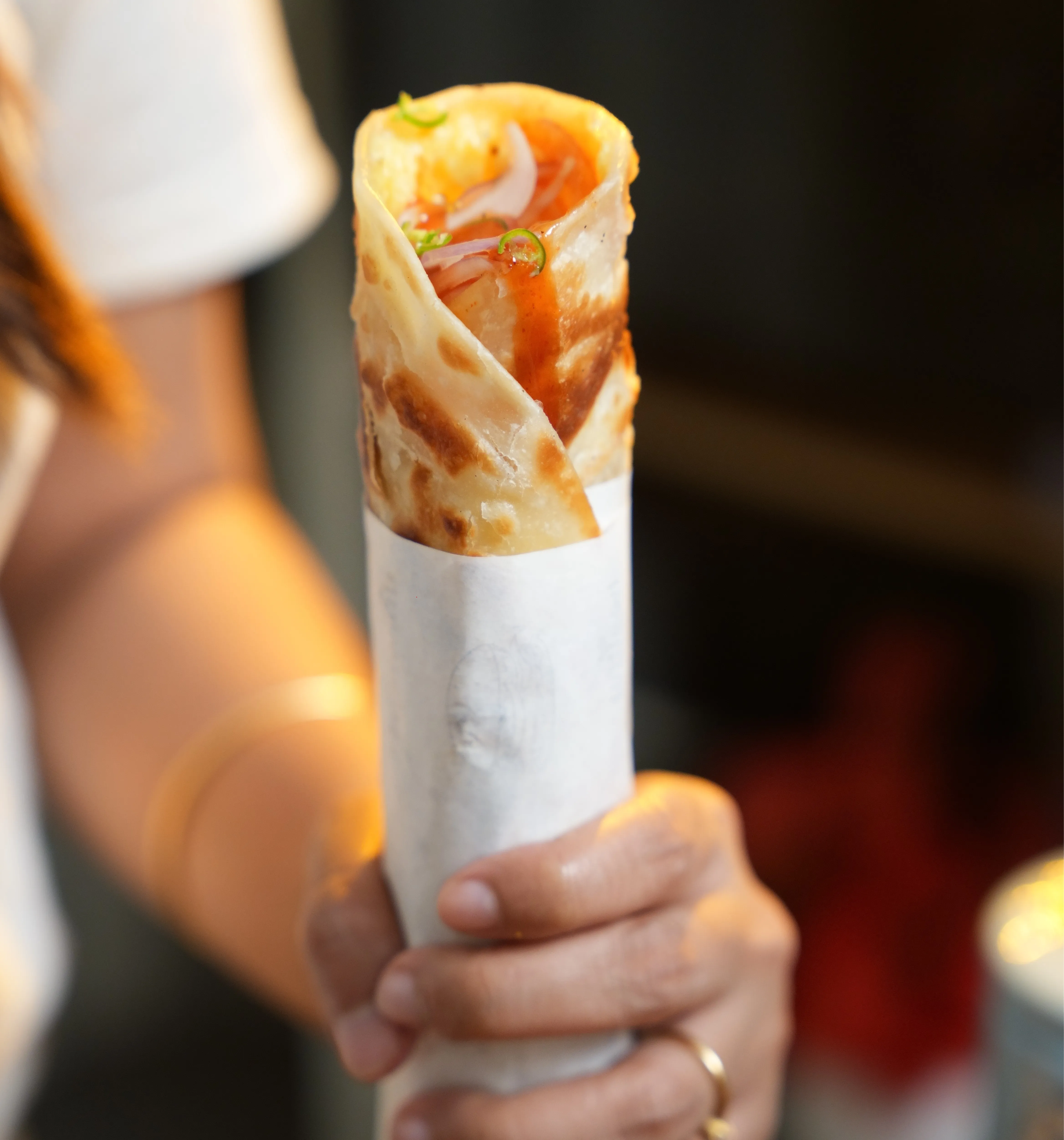 Kolkata egg roll with flaky laccha paratha and a double egg coating.