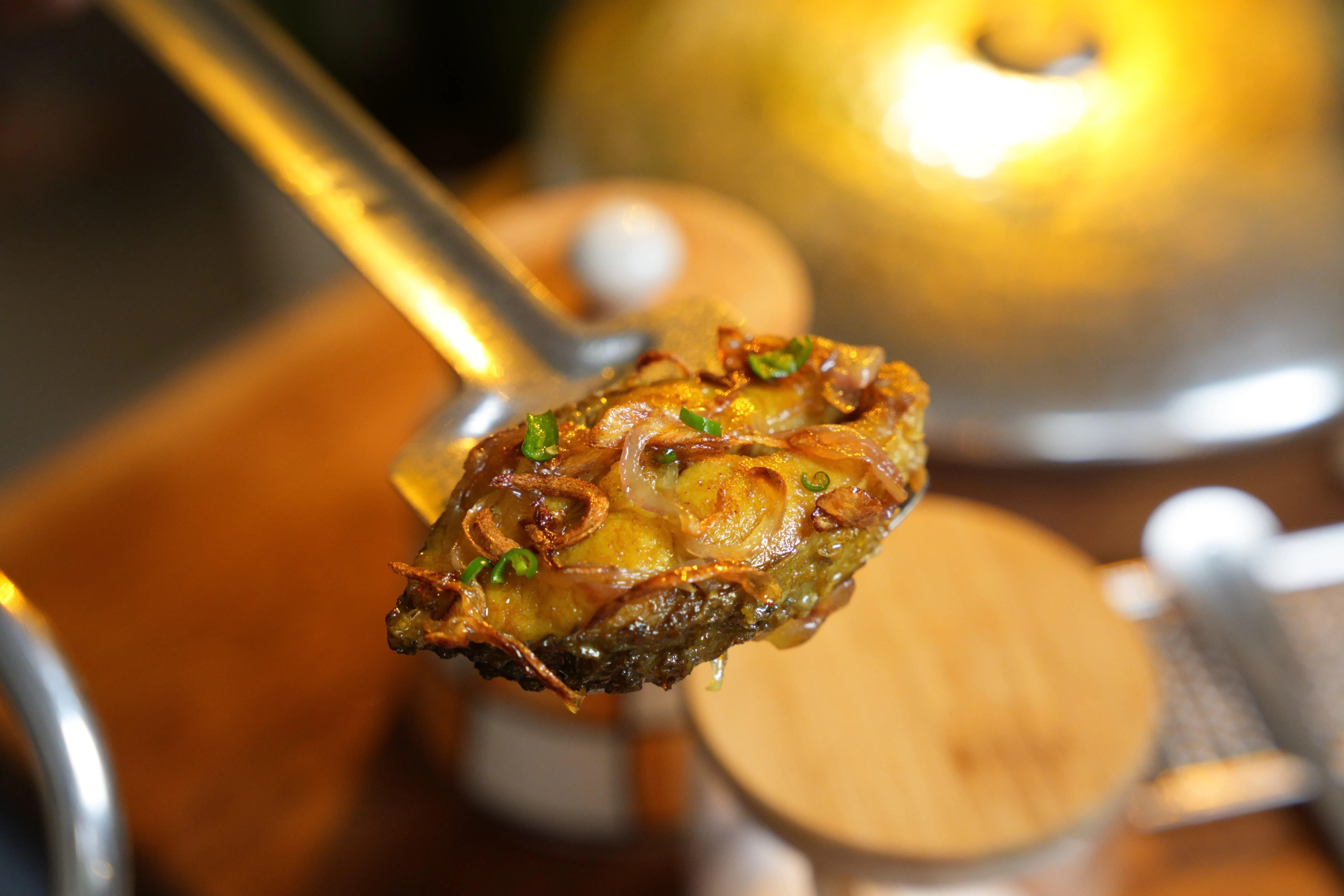 Golden Bengali maach bhaja made with rui or katla fish.