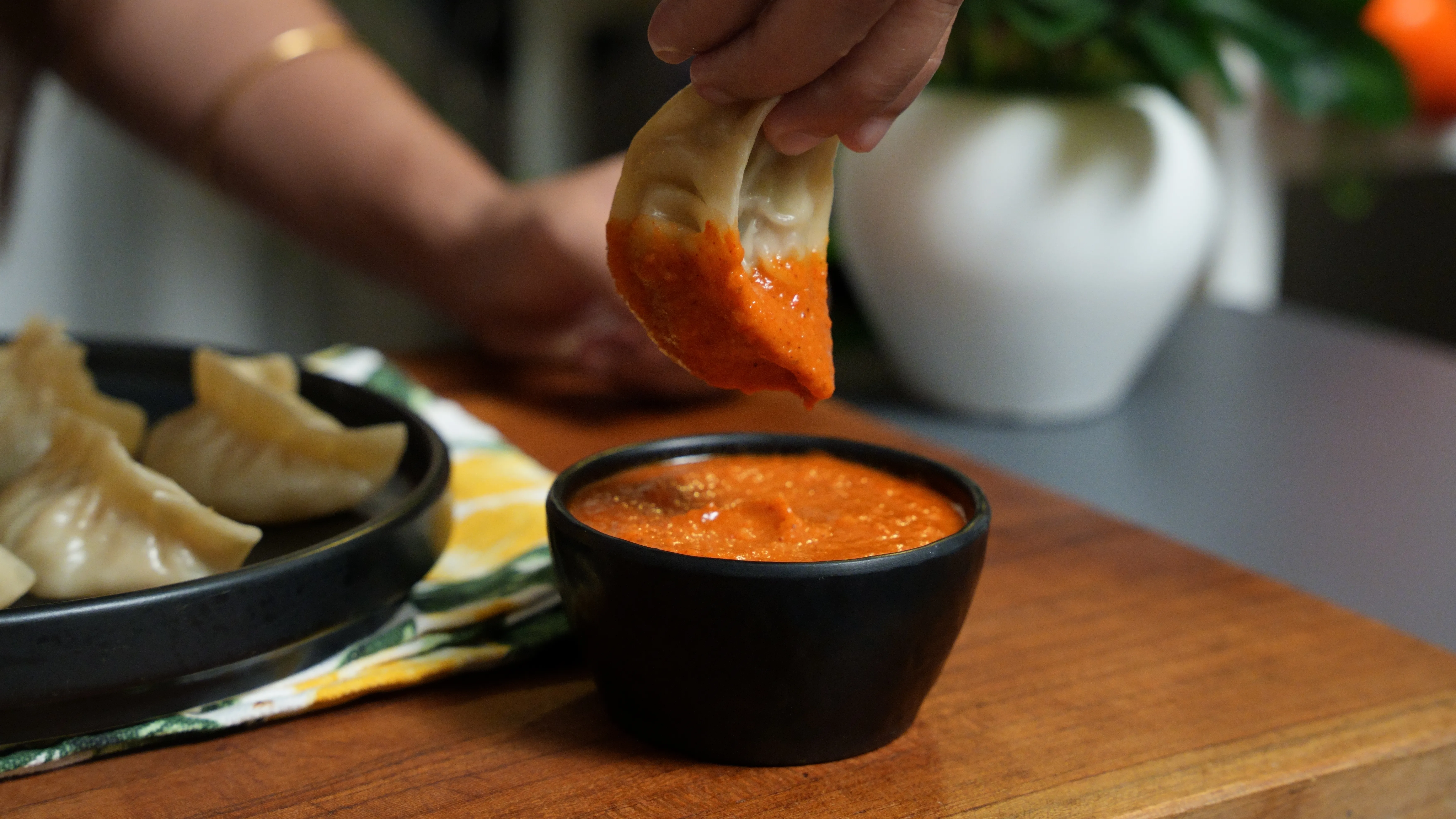 Spicy homemade Momo Chutney made with charred tomatoes, garlic, ginger and green chillies.